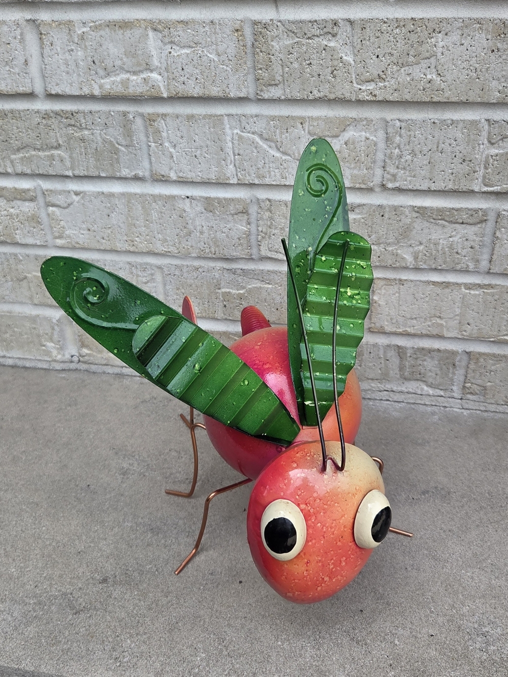 Pink and Green Metal Bug Sculpture